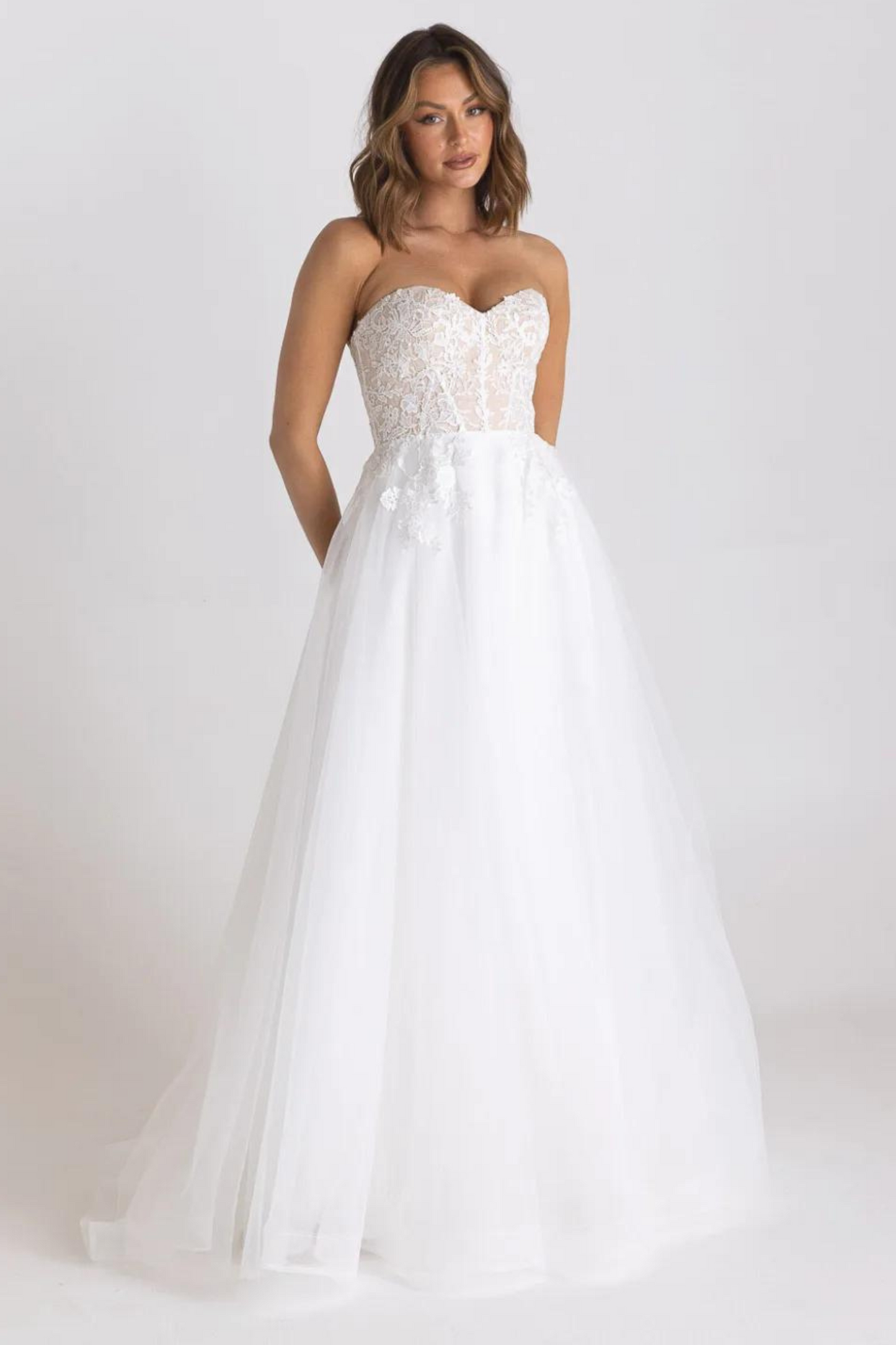 Tania Olsen a-line formal dress with embroidered lace bodice and tulle and glitter skirt in vintage white