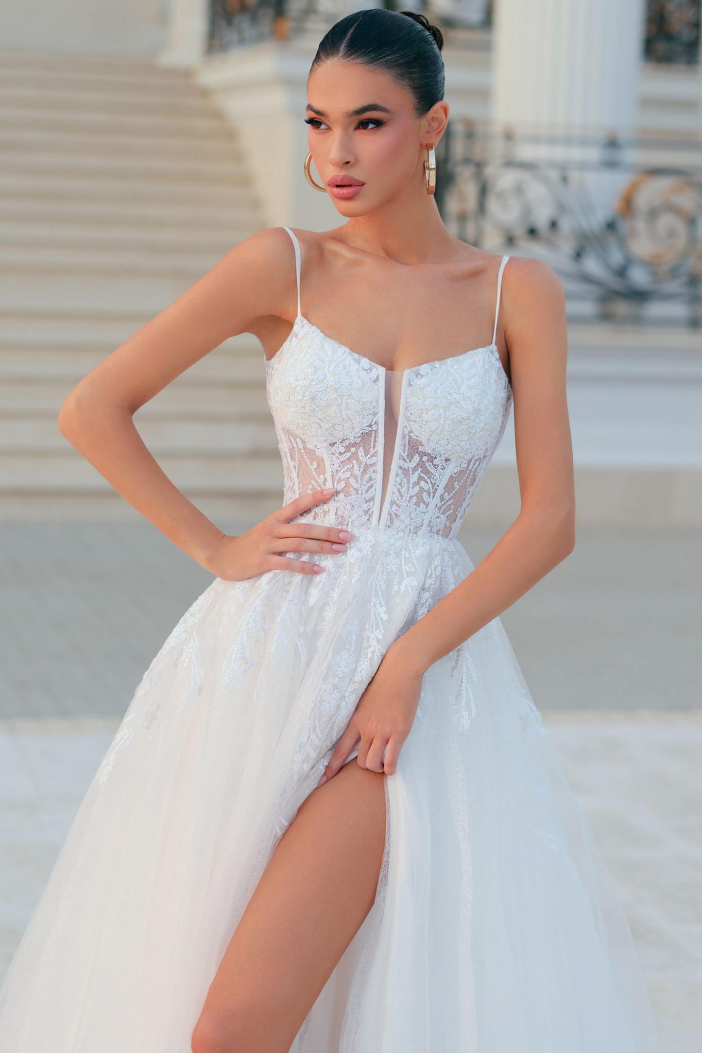 Tina Holly wedding dress with corseted lace bodice and attached overskirt with train in off white glitter tulle