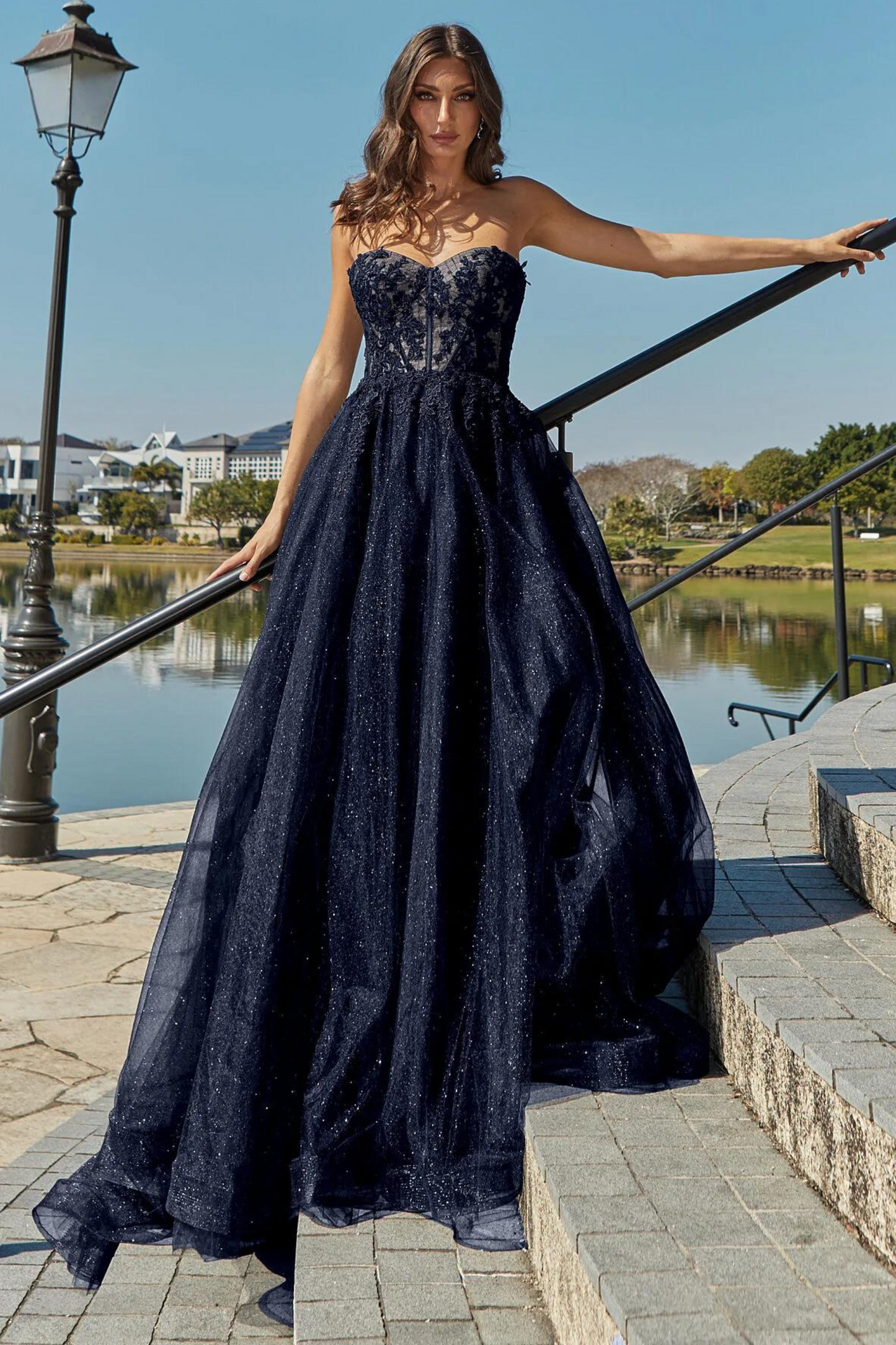 Tania Olsen a-line formal dress with embroidered lace bodice and tulle and glitter skirt in navy