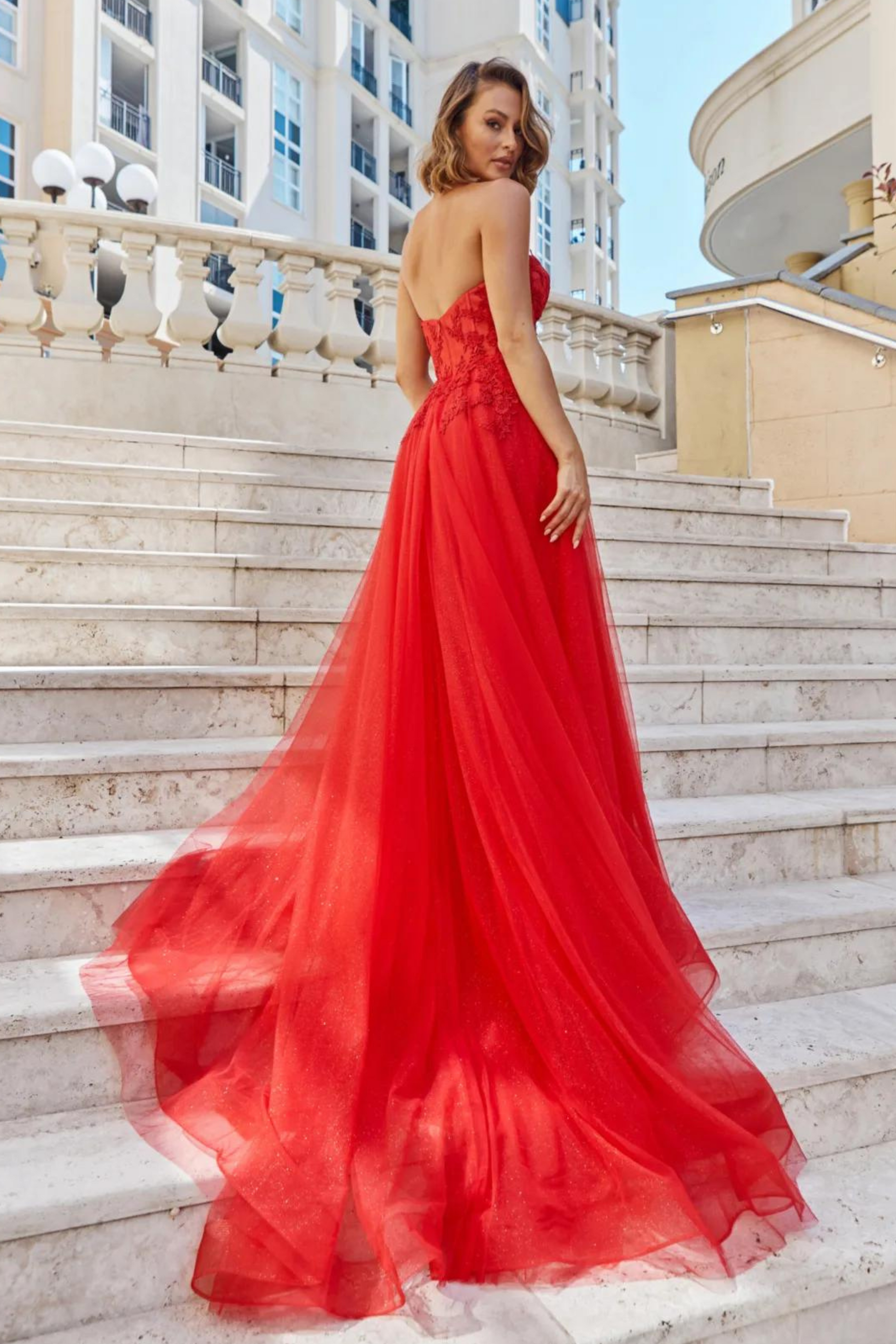 Tania Olsen a-line formal dress with embroidered lace bodice and tulle and glitter skirt in red