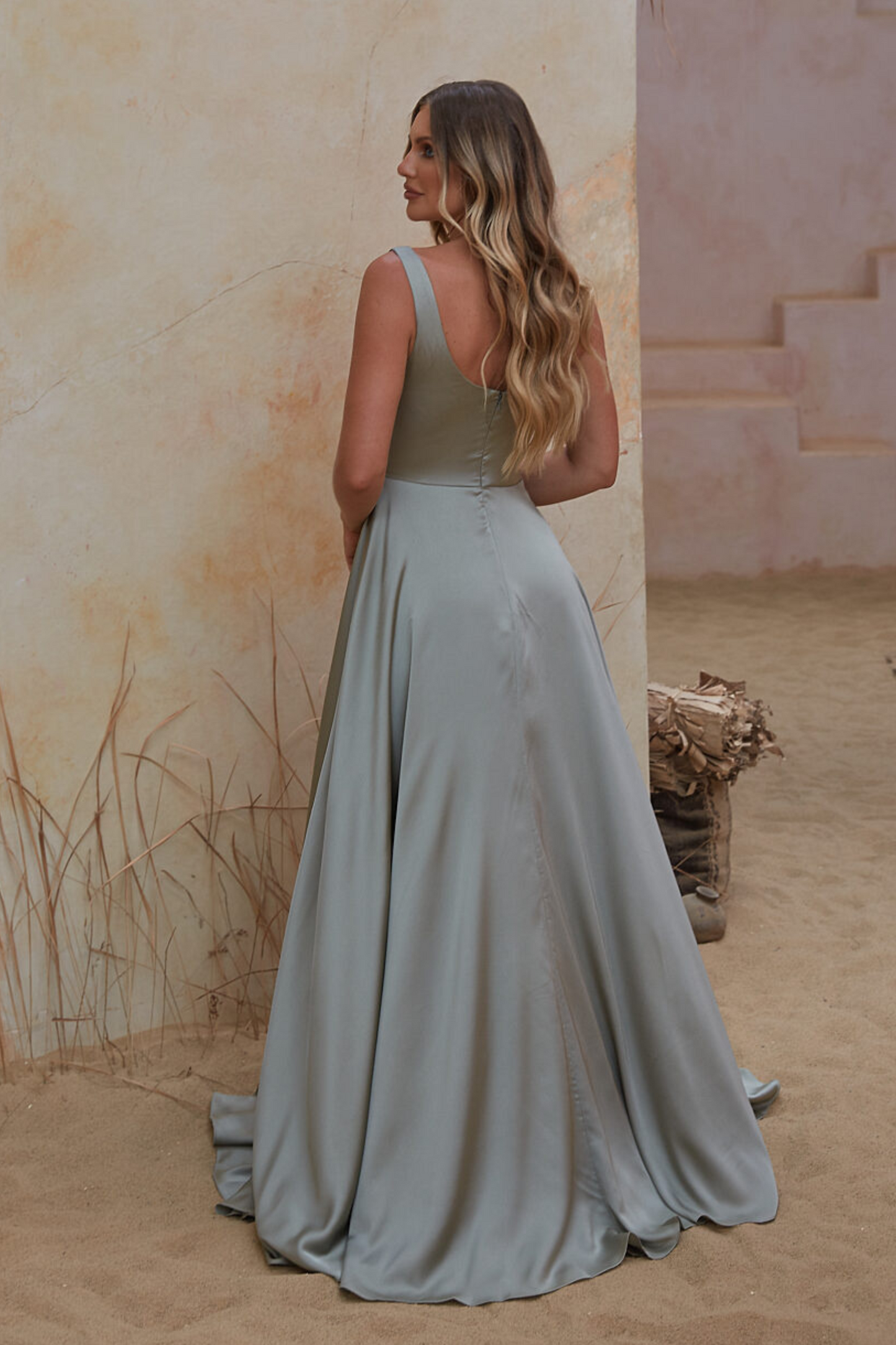 Tania Olsen Moana bridesmaid dress with square neckline and wrap skirt in sage green satin