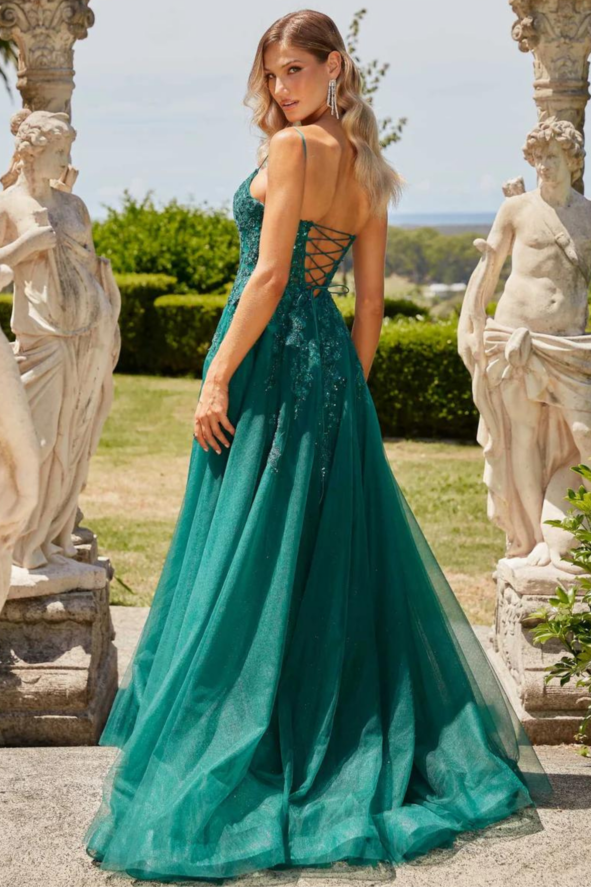 Tania Olsen a-line formal dress in emerald lace and tulle
