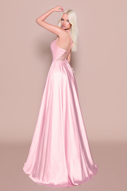 Woman wearing a pink satin evening/bridesmaid gown showing the back of the dress