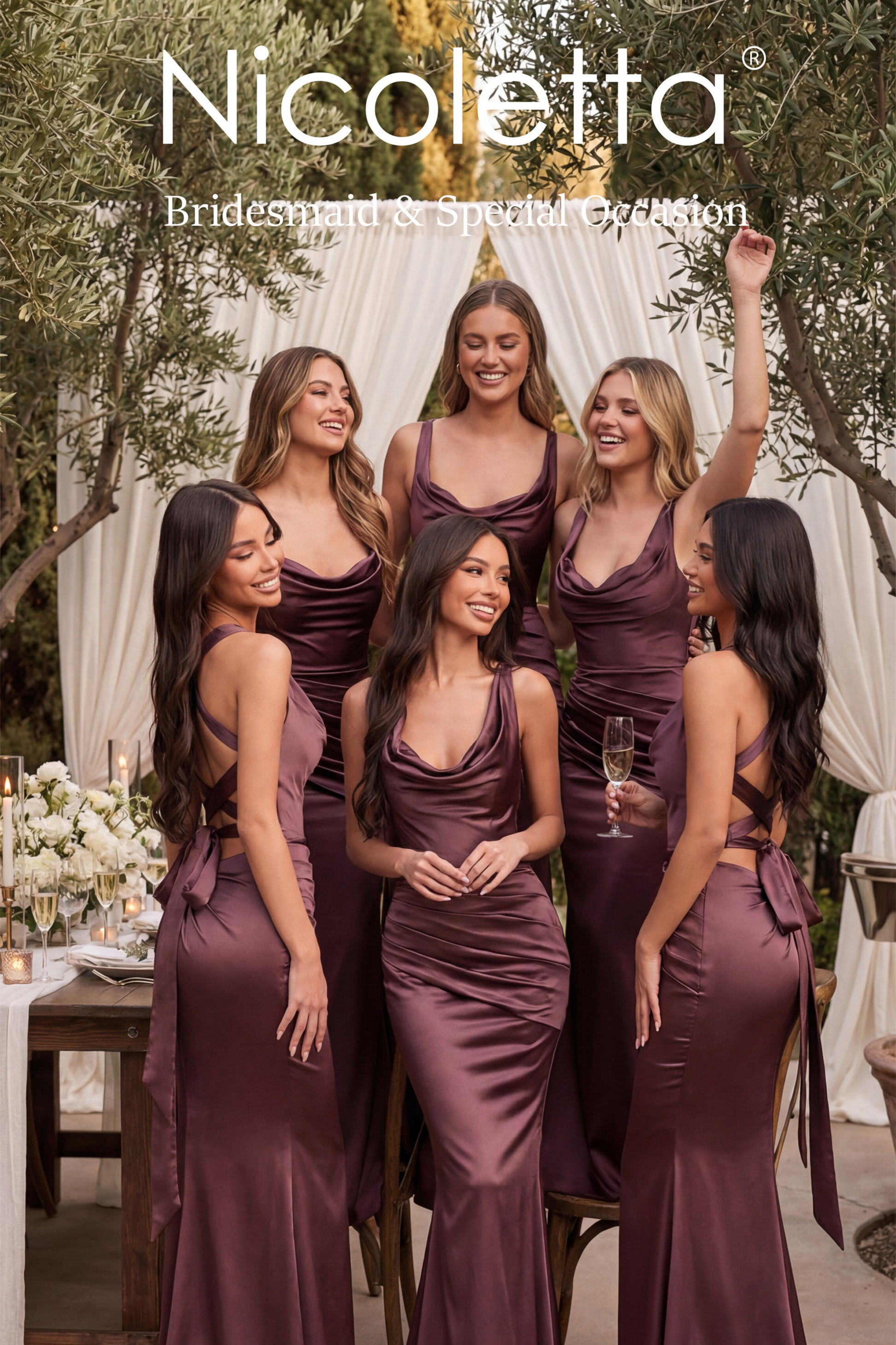 Group of women in Nicoletta bridesmaid dresses at an outdoor event.