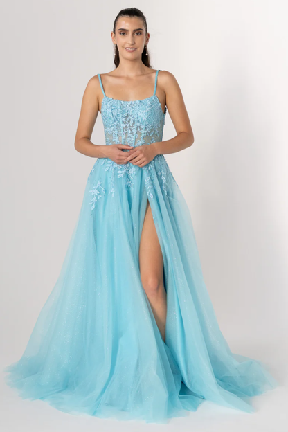 Light blue evening gown with a slit on a white background