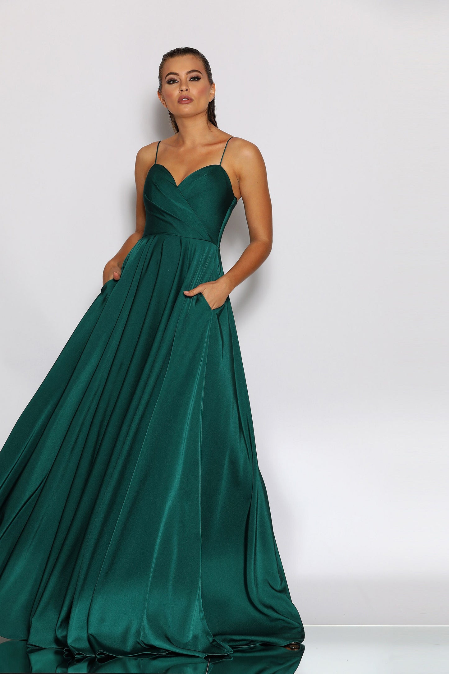 Nicoletta a-line formal dress in dark green soft suiting